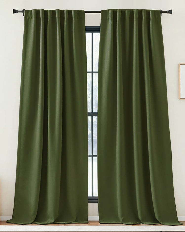 Soft dark green Zoe linen look custom drapery panels with a rod pocket header, creating elegant home window treatments.