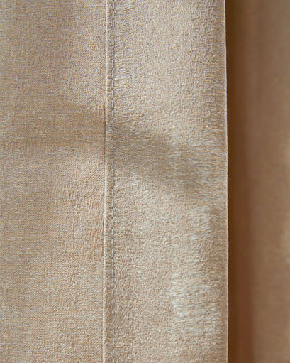 Close-up of Glimmer Linen Blend Lightweight Textured Custom Curtain fabric in light beige, showing intricate weave and subtle sheen.
