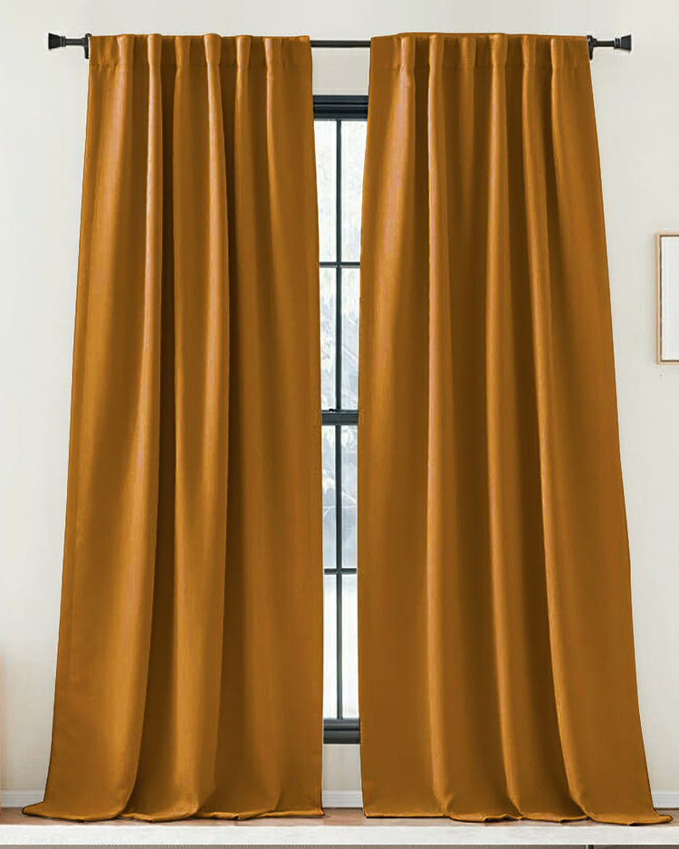 Golden brown custom linen-look drapery with a rod pocket header, offering soft tailored elegance for window treatments.
