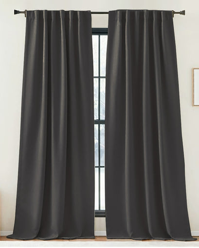Charcoal Zoe linen look custom drapery panels with tailored pleats on a rod, offering sophisticated privacy & light control.