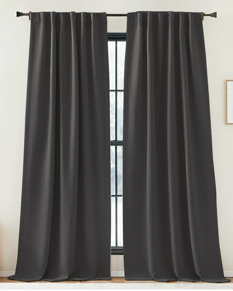 Charcoal Zoe linen look custom drapery panels with tailored pleats on a rod, offering sophisticated privacy & light control.