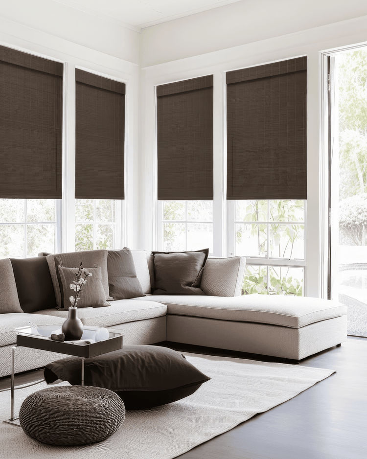 Modern living room featuring Bark Hana Bamboo Motorized Woven Shades on multiple windows, providing tailored privacy and elegant light control.