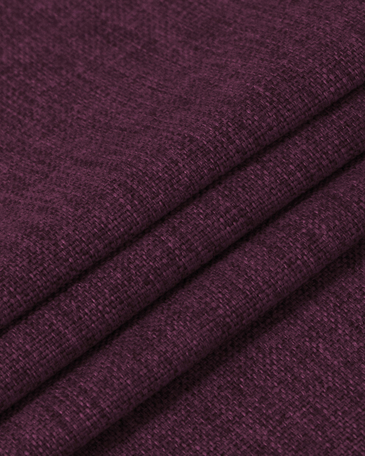 Close-up of dark burgundy Victoria 100% blackout OEKO linen look custom curtain fabric with visible woven texture & soft folds.