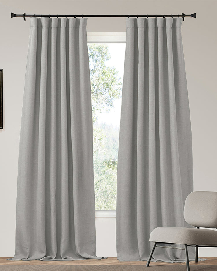 Grey Zoe 4-layer custom blackout curtains with linen-look texture, on black rod, showcasing heavyweight, thermal & soundproof qualities.