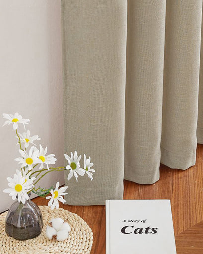 Chloe linen look burlap textured sheer curtain in a neutral tone, highlighting its light-filtering fabric and elegant drape for custom window treatments.
