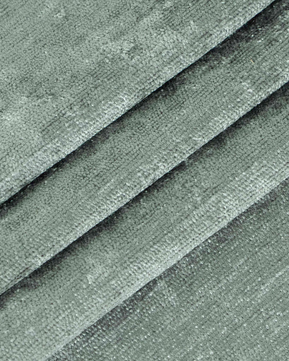 Luxurious Quinn 100% Blackout Heavyweight Velvet custom curtain fabric, folded to show its deep pile and soft, rich texture.