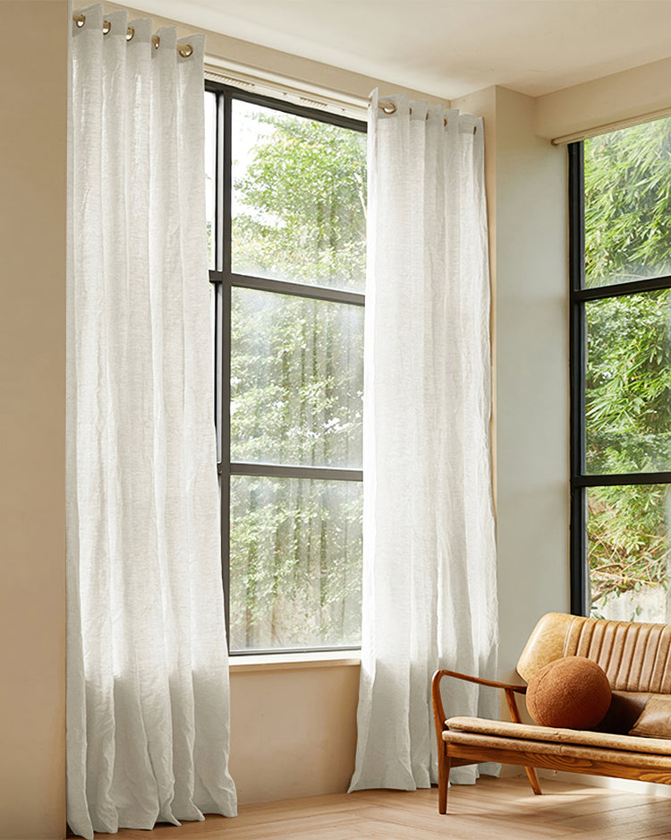 Tall Kyoto 100% linen semi-sheer custom curtains with grommet header on a large window, enhancing privacy & light control.