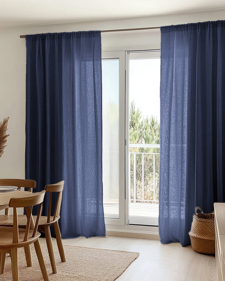 Made-to-measure navy blue yarn linen-look sheer custom curtains on a rod pocket, enhancing a dining room with privacy and soft light control.