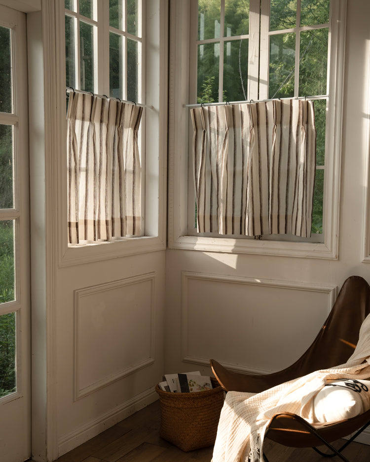 Sunlit windows showcasing custom Cate 100% linen striped cafe curtains, perfect for privacy, light control, and aesthetic.