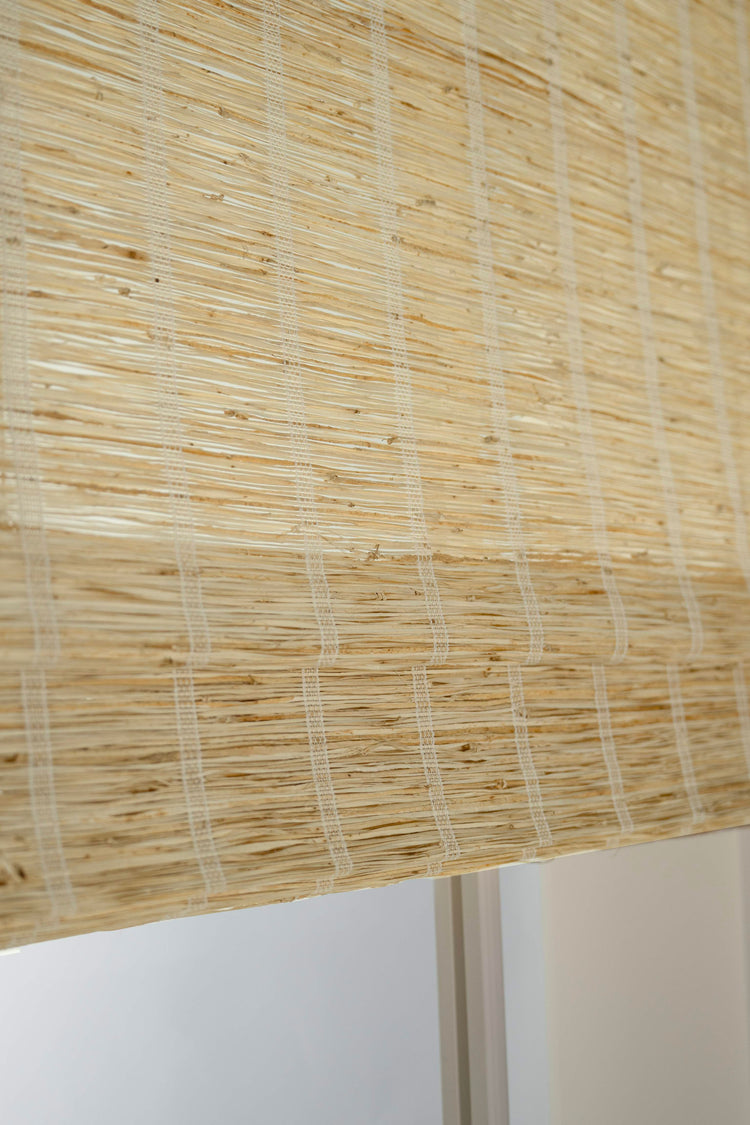 Cream Rumi jute woven shade, close-up revealing its intricate natural texture and detail for tailored home decor.