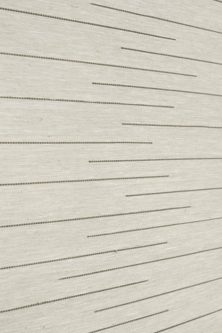White Kaia linen bamboo woven shade close-up, showcasing its natural texture and horizontal striped pattern for elegant window treatments.