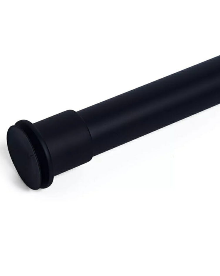 Matte black adjustable no-drill tension curtain rod, designed for effortless installation in home decor.