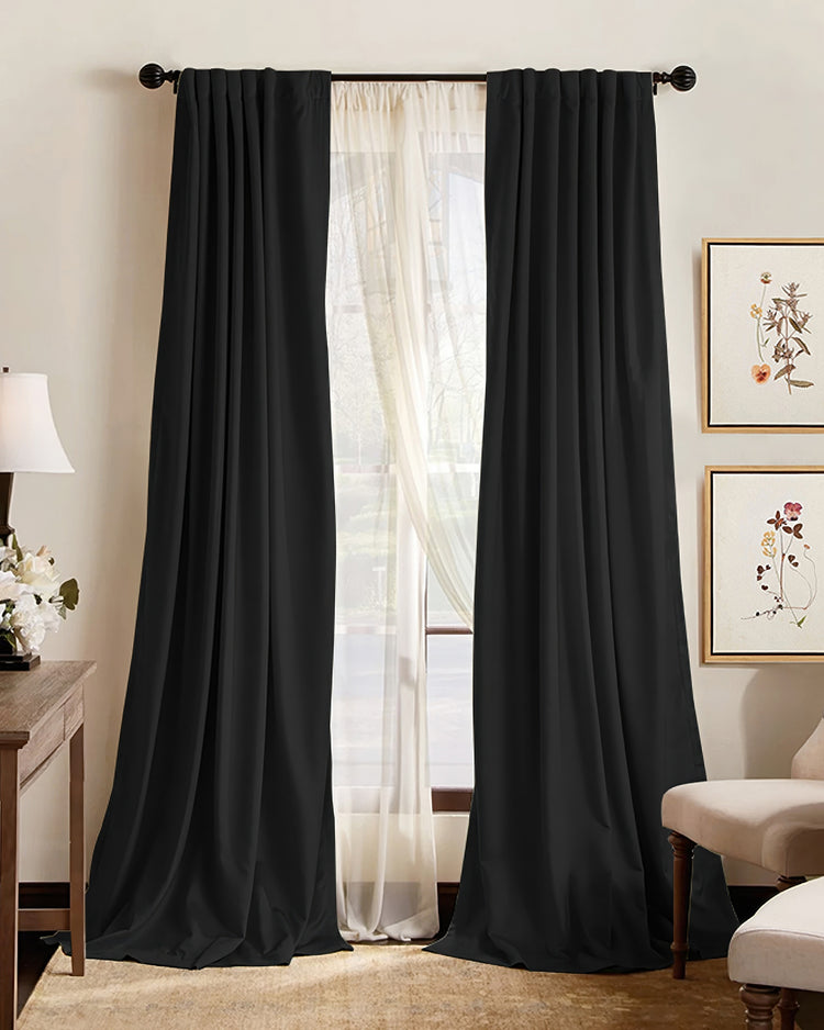Premium black 100% blackout custom curtains by TheHues. Made-to-measure Hussein drapery for superior soundproof, thermal & light control.