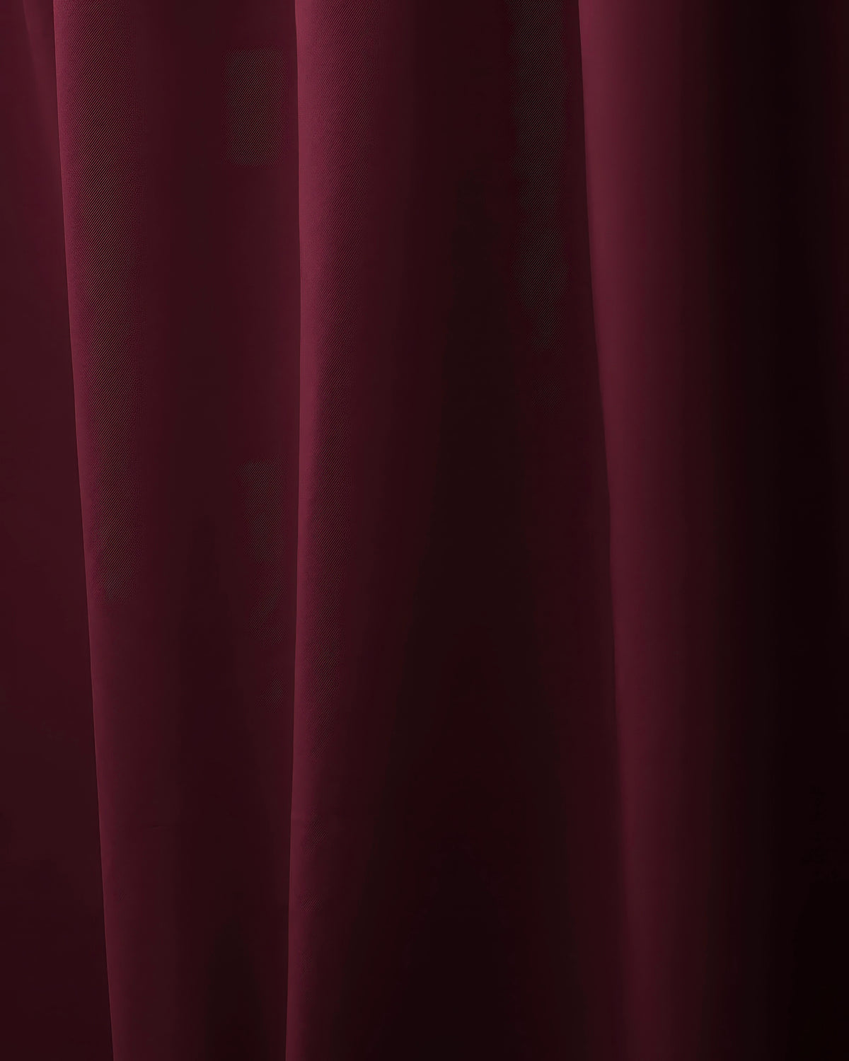 Luxurious Hussein OEKO certified custom curtain in rich burgundy, showcasing a thick blackout-style fabric with soft folds.