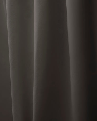 Close-up of Hussein OEKO Certified custom dark grey drapery fabric, highlighting its subtle diagonal weave texture and soft folds.