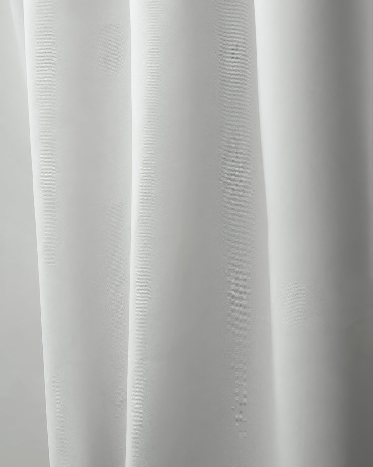 Close-up of Hussein OEKO Certified custom white drapery fabric, revealing its premium woven texture & soft, elegant folds.