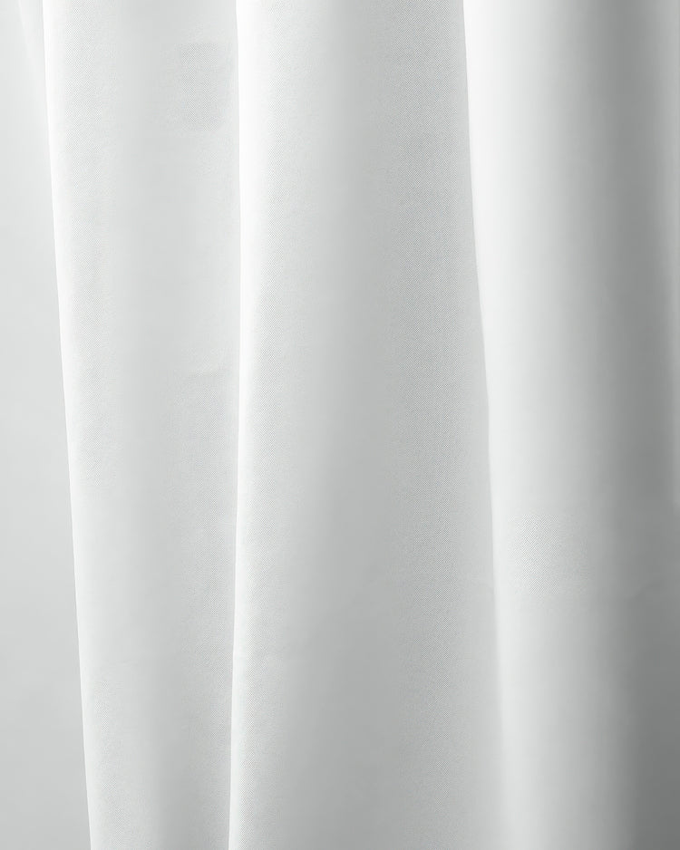 Close-up of white Hussein OEKO Certified custom curtain fabric with soft folds, highlighting its texture for elegant home decor.