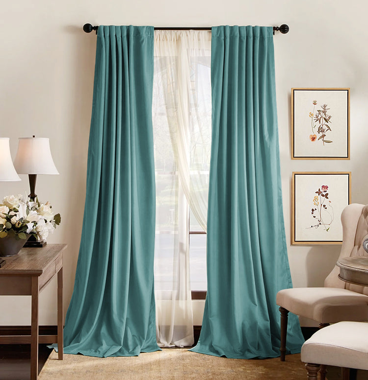 Premium custom teal blackout curtains, 100% blackout, with sheer drapes & elegant hardware, offering thermal and privacy control.