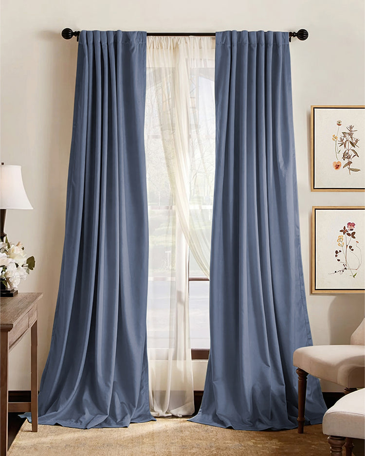 Dusty blue custom blackout curtains, 4-layer soundproof thermal window treatments with elegant pinch pleat header, over sheer drapes.
