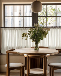 TheHues Kyoto 100% linen semi-sheer custom cafe curtain creates natural elegance & privacy in a bright dining nook.