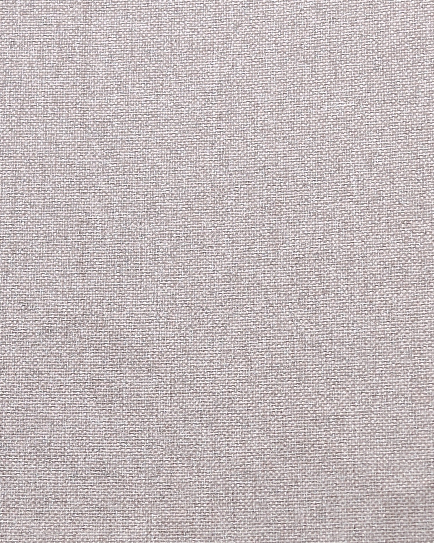 Detailed woven fabric texture of the Linden light mauve 100% blackout custom curtain.