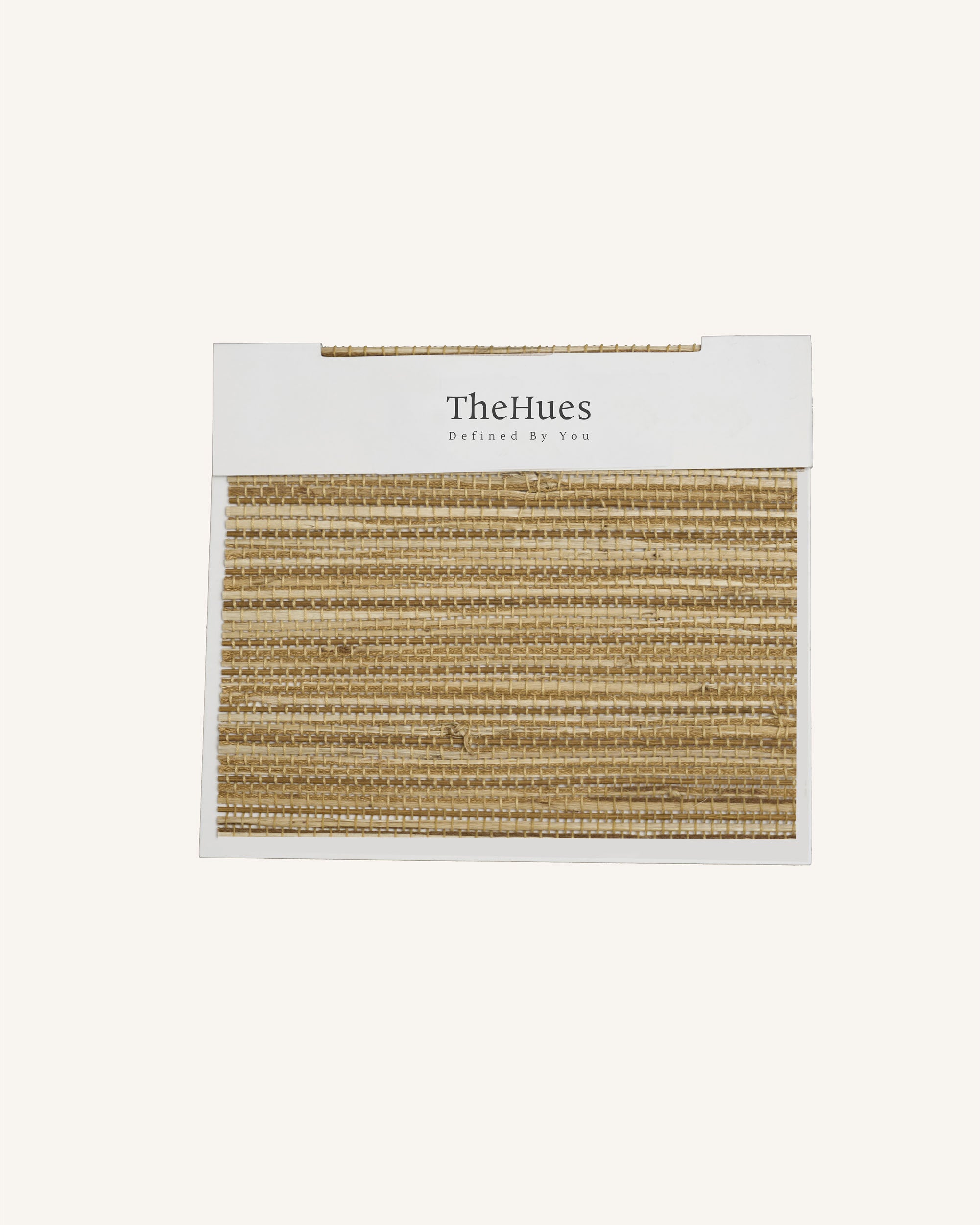 TheHues Mia Jute Woven Shade Fabric swatch in straw, highlighting the natural, rustic texture for tailored window treatments.