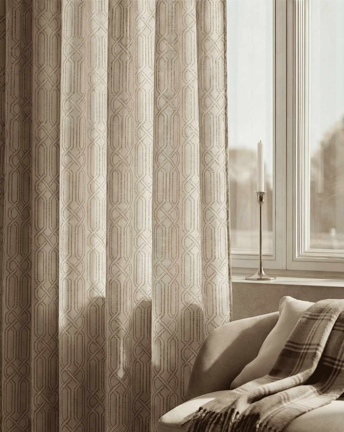 Interlace linen blend patterned custom curtain with a beige geometric trellis design hanging in a bright living room.
