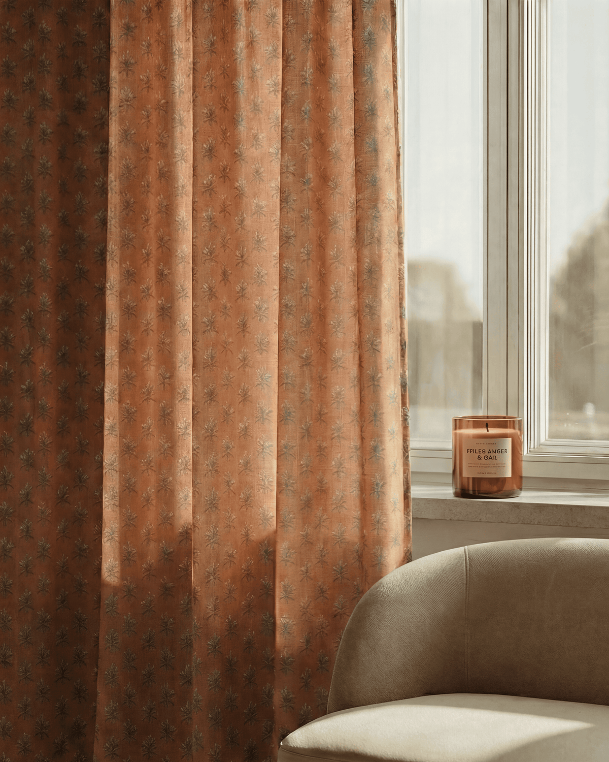 Rhythm Floral Patterned Sheer Custom Curtain in burnt orange with delicate motifs, hung beside a sunlit window.