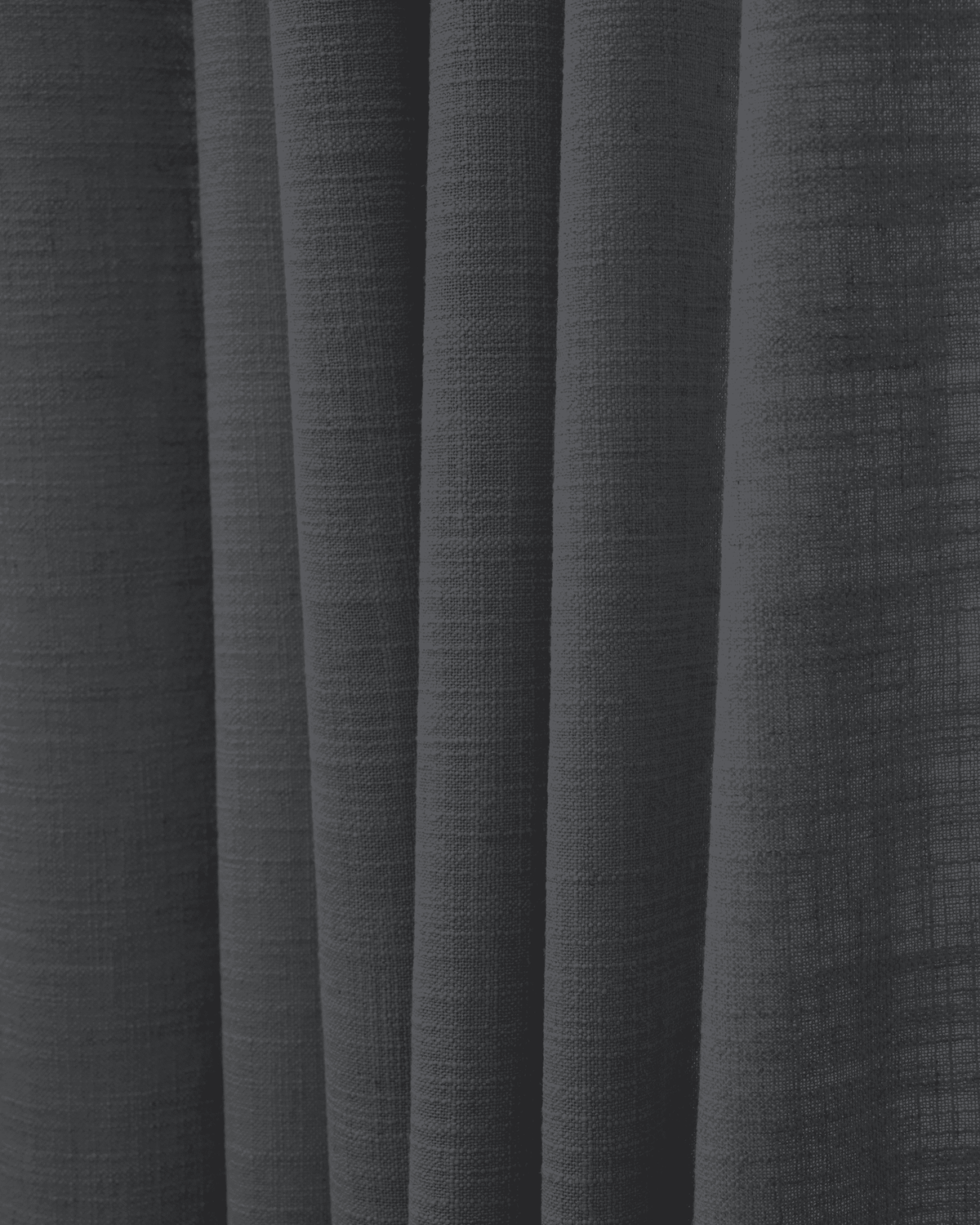 Close-up of Cassie Linen Blend fabric swatch in dark gray, showcasing the natural texture and elegant folds for custom drapery.