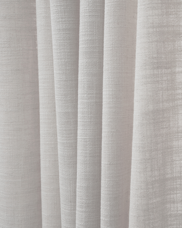 Cassie Linen Blend Fabric close-up, showcasing its natural textured weave and graceful soft folds in a light hue for custom drapery.