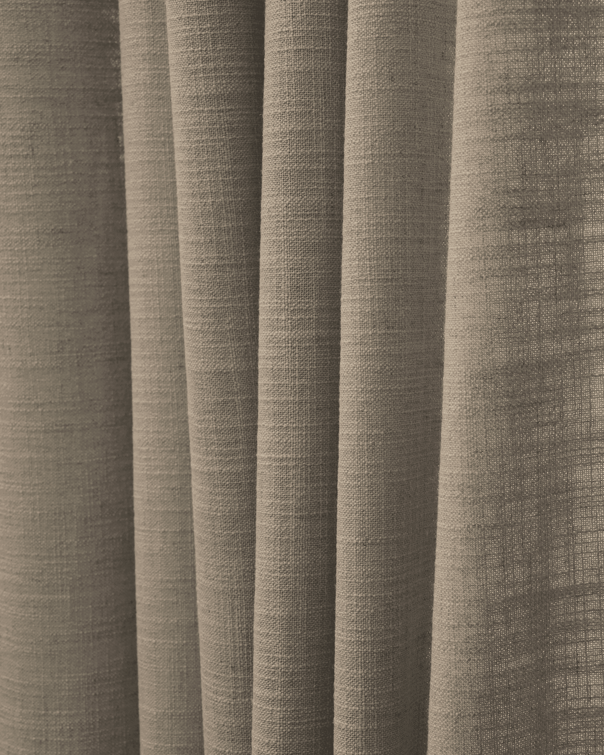 Close-up of draped Cassie linen blend fabric, showcasing its natural texture and weave for custom window treatments.
