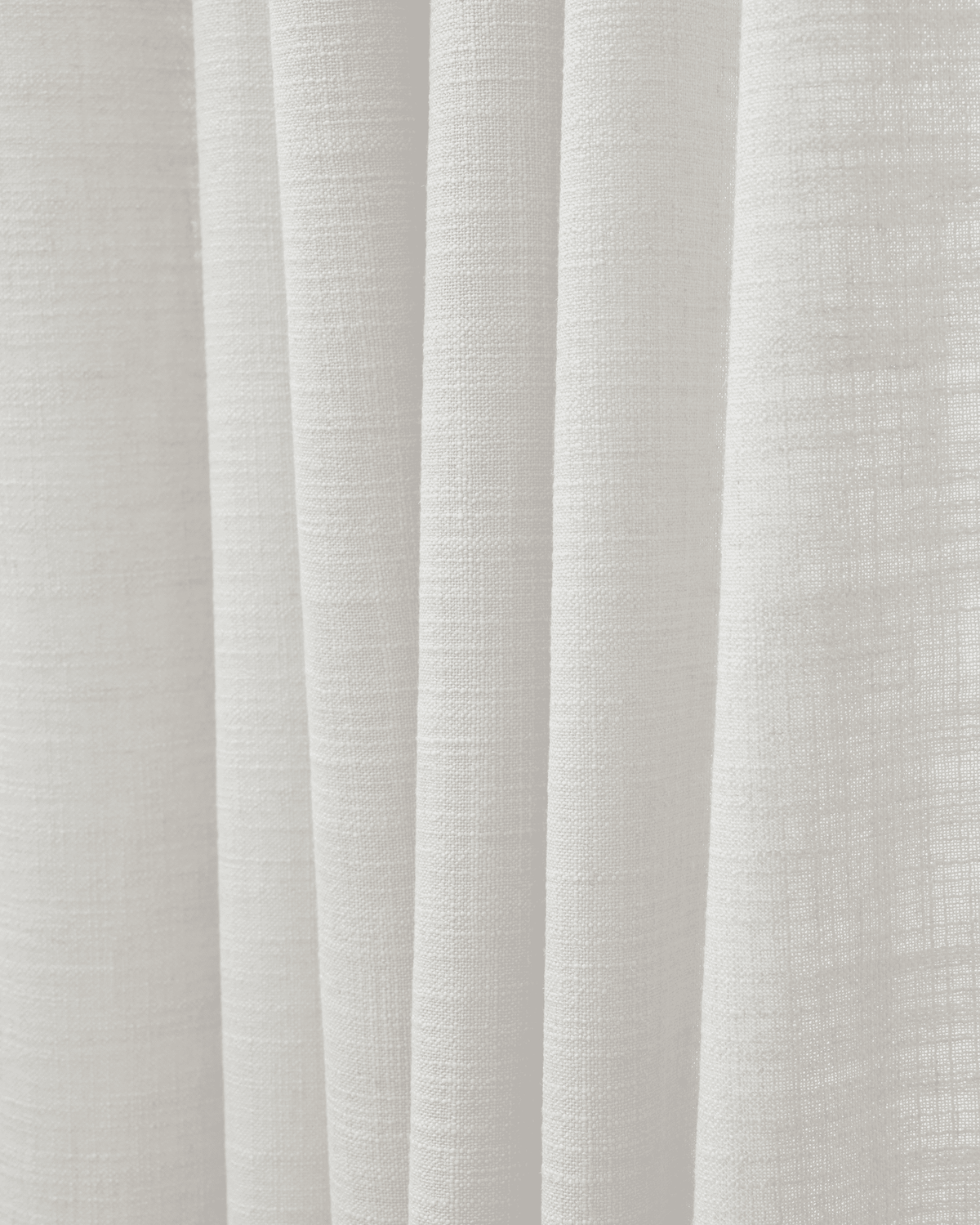 White textured Cassie linen blend fabric swatch, highlighting its natural weave and soft folds for custom window treatments.