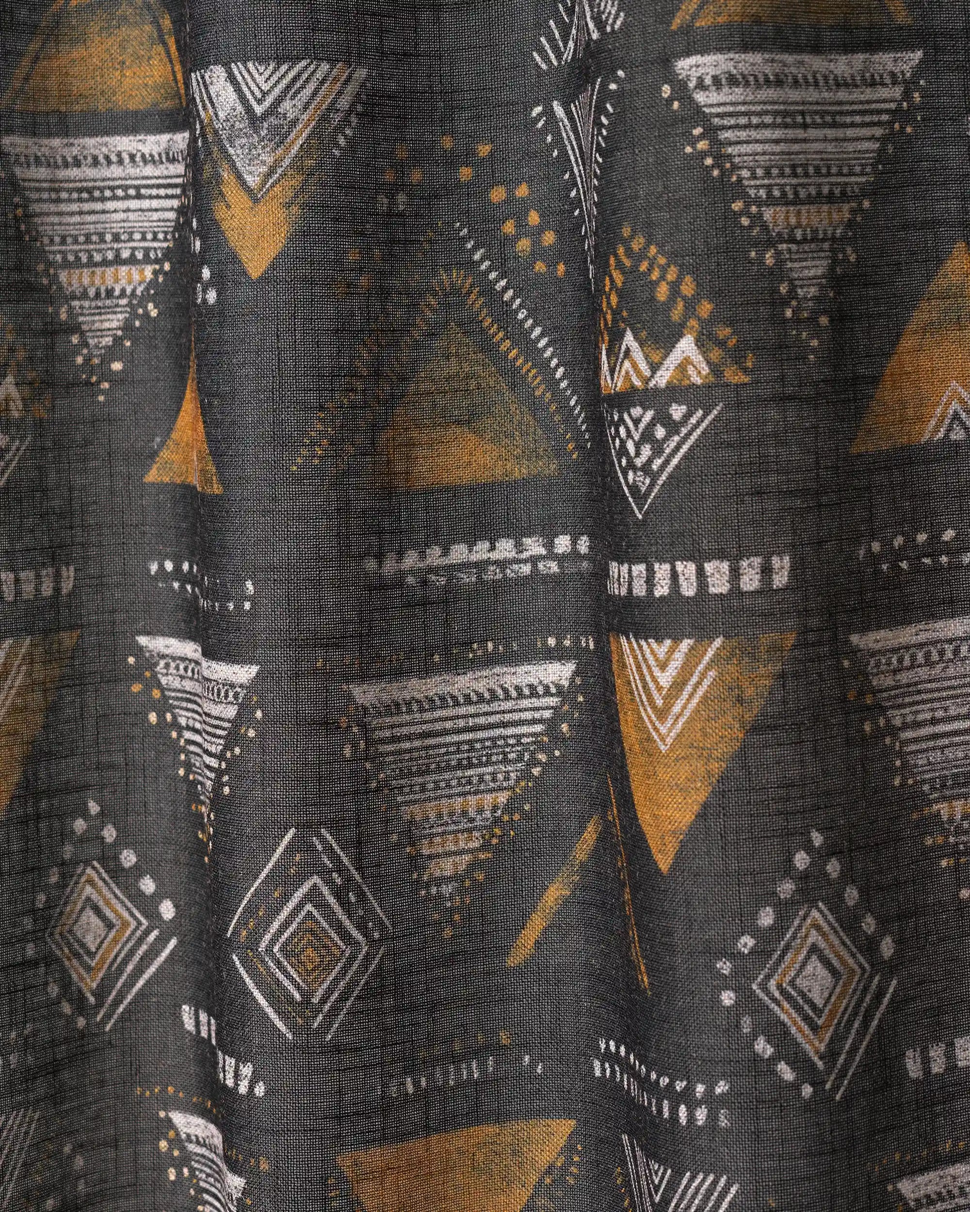 Echo Patterned Sheer Fabric Swatch with dark grey, mustard yellow, and white geometric triangle and diamond designs.