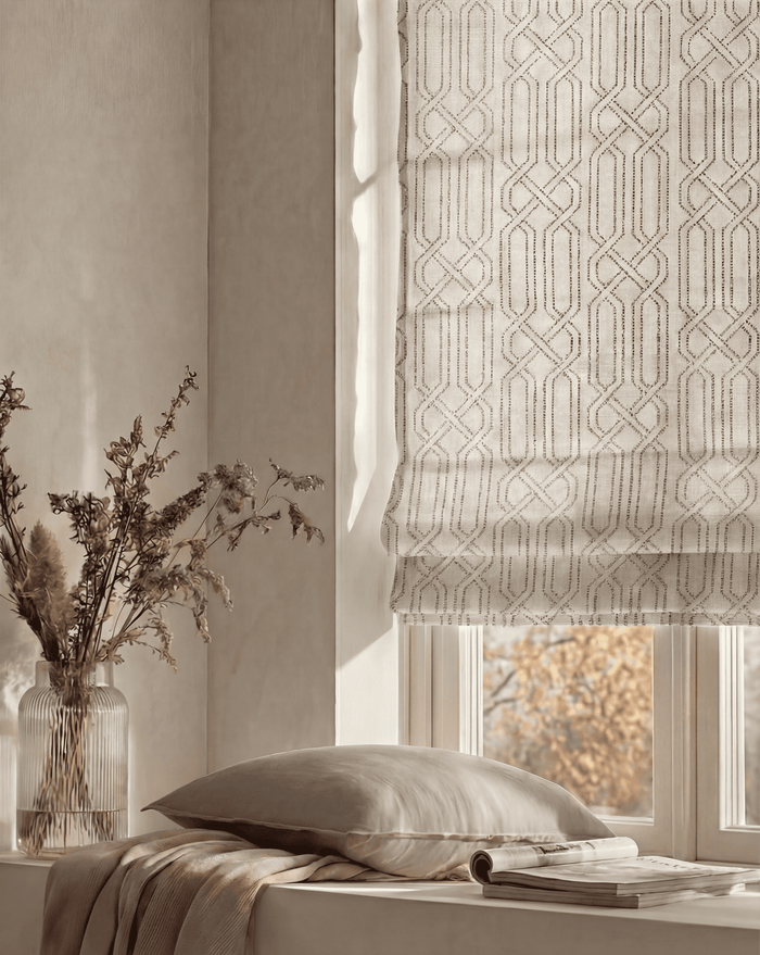 Interlace Flat Fold Linen Blend Cordless Custom Roman Shade with geometric pattern on window in cozy room setting.