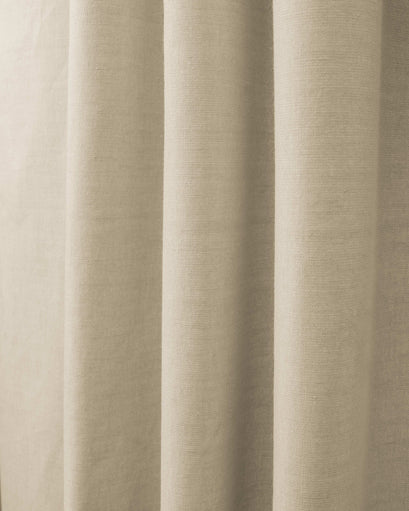 Close-up of Cronin linen look blackout custom curtain fabric in a natural beige, showing textured weave and soft folds.
