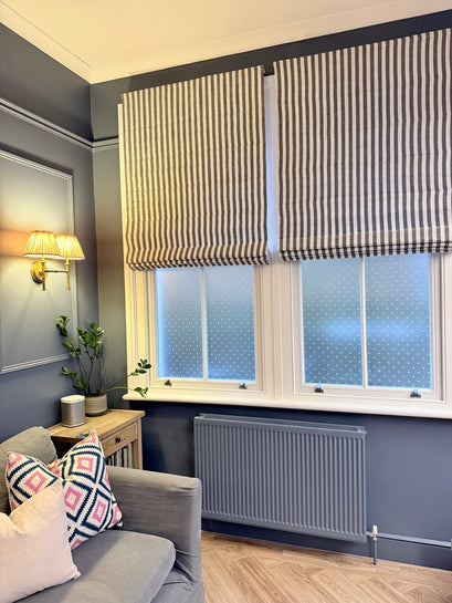 Milano Flat Fold Linen Blend Striped Cordless Custom Roman Shade — styled living room window