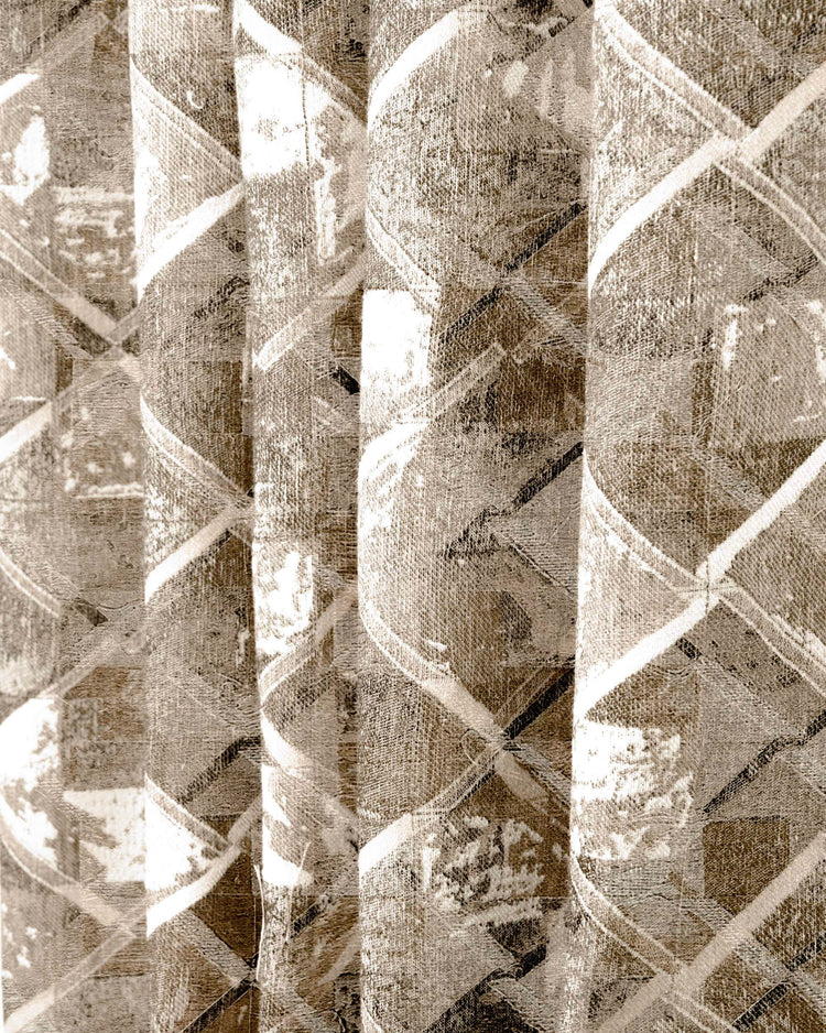 Close-up of rich linen & wool blend custom curtain, featuring a deconstructed heavyweight geometric patterned fabric with distinct texture.