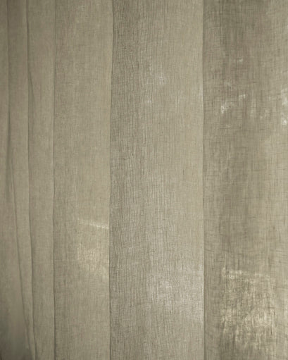 Close-up of Helena 100% pure linen custom curtain fabric, highlighting its natural woven texture and light-filtering quality.