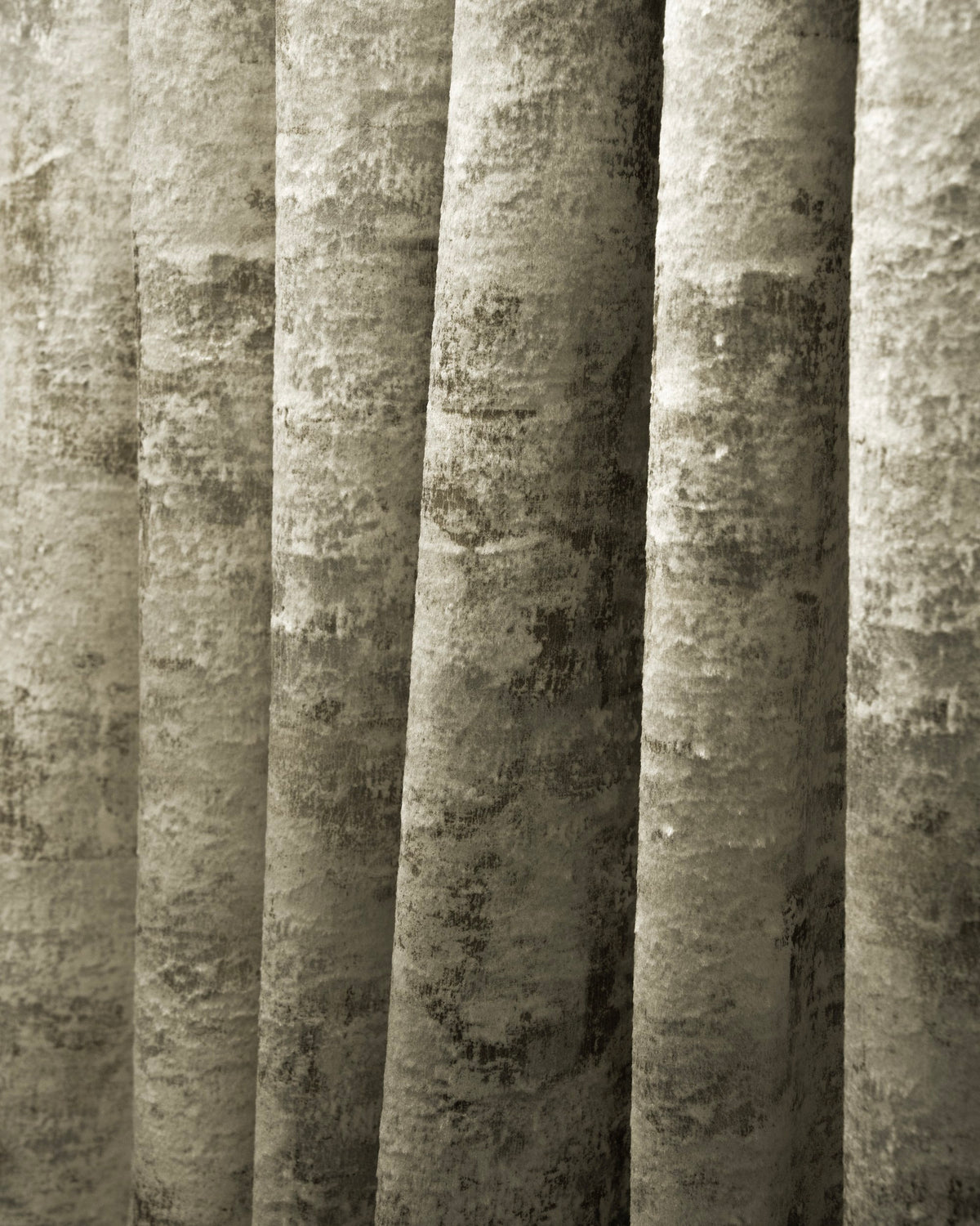 Close-up of Impression Foil Printed Velvet custom curtain, highlighting its unique textured pattern and soft, elegant folds.