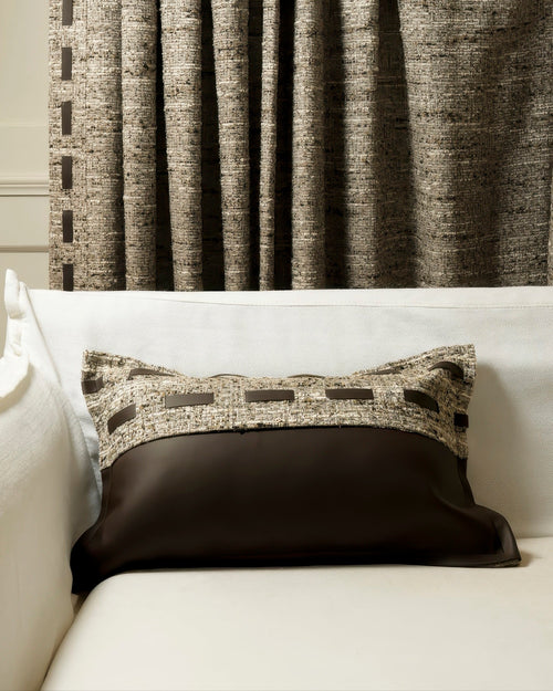 Juliette custom lumbar pillowcase, dark faux leather & textured woven fabric with accents, on white sofa, matching sophisticated drapery.