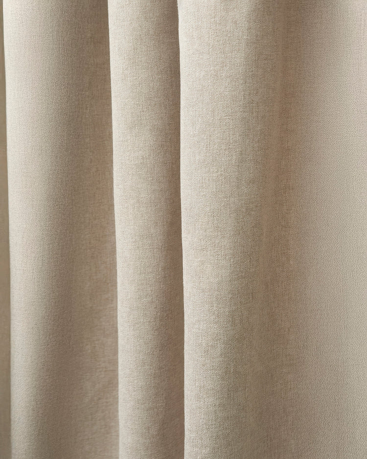 Detailed view of Laborien Linen Look Textured Custom Drapery fabric, highlighting its natural woven pattern in a soft beige tone.