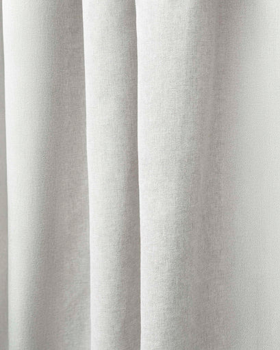 Close-up of light grey Laborien custom linen-look textured curtain fabric, showcasing its subtle slub weave and elegant drape.
