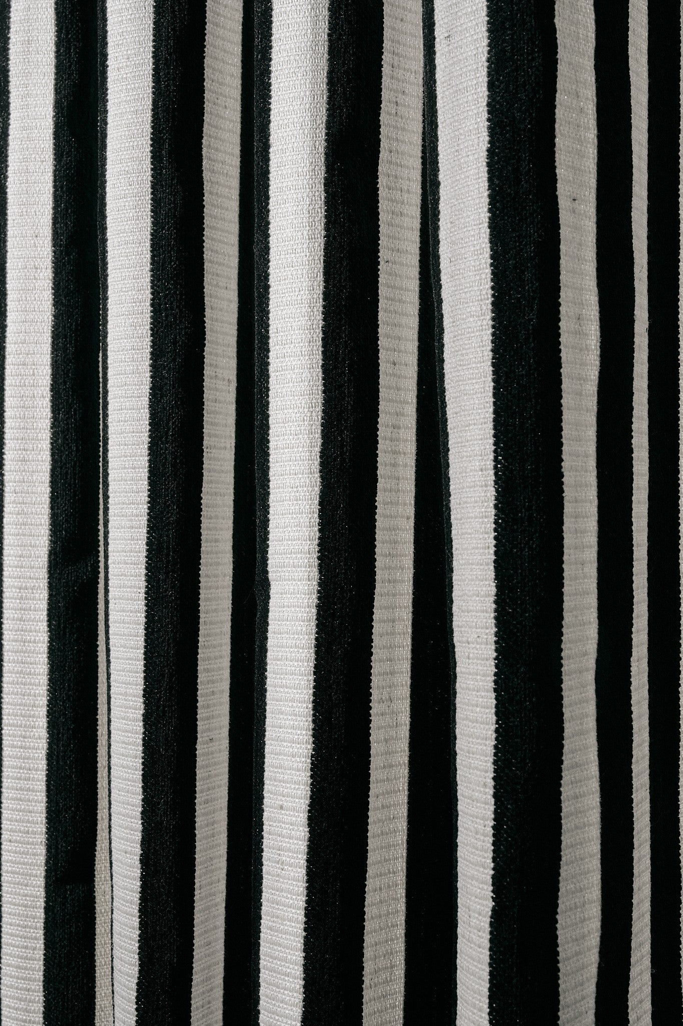 Textured Liam & Renee vertical stripe fabric swatch in bold black and white, ideal for custom made-to-measure drapery.
