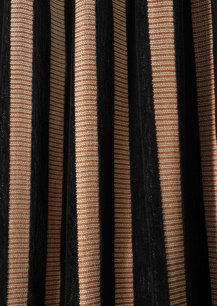 Close-up of Liam & Renee striped linen blend fabric swatch with alternating vertical black and natural tan textured stripes for custom drapery.