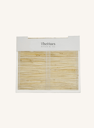 Packaged bamboo blinds with 'TheHues' branding on a white background