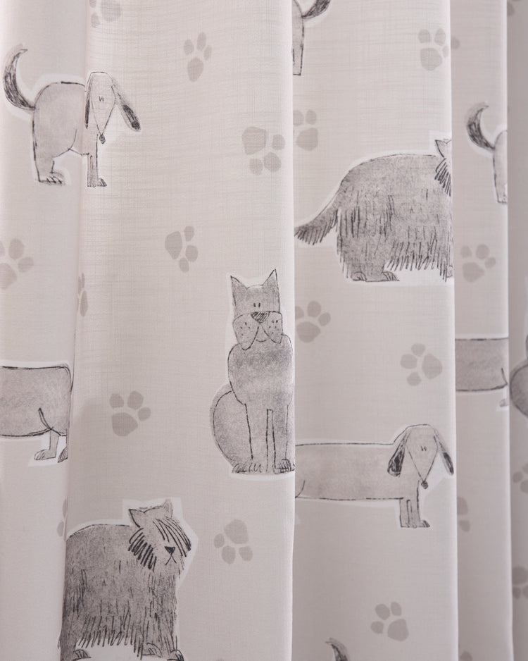 Gray & white Paws Patterned custom kids drapery fabric with sketched dogs, cats, & paw prints for a whimsical window treatment.