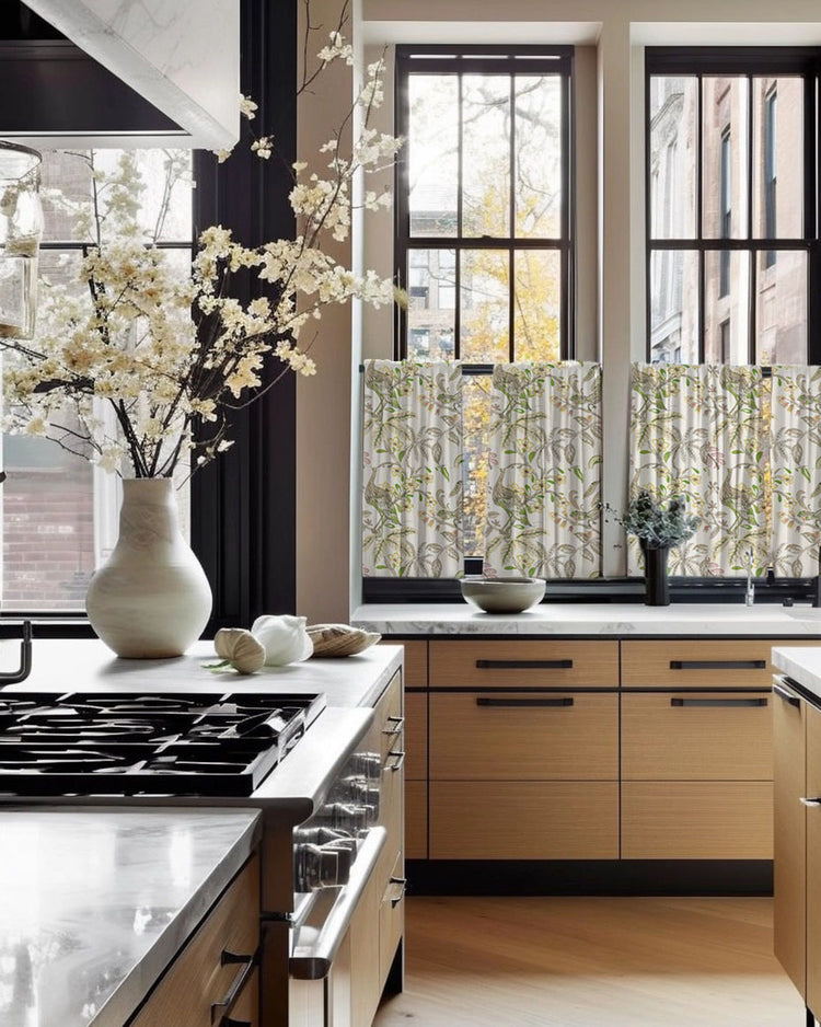 Peacock Linen Blend Heavyweight Floral Patterned Custom Cafe Curtains hung on large kitchen windows above marble counters.