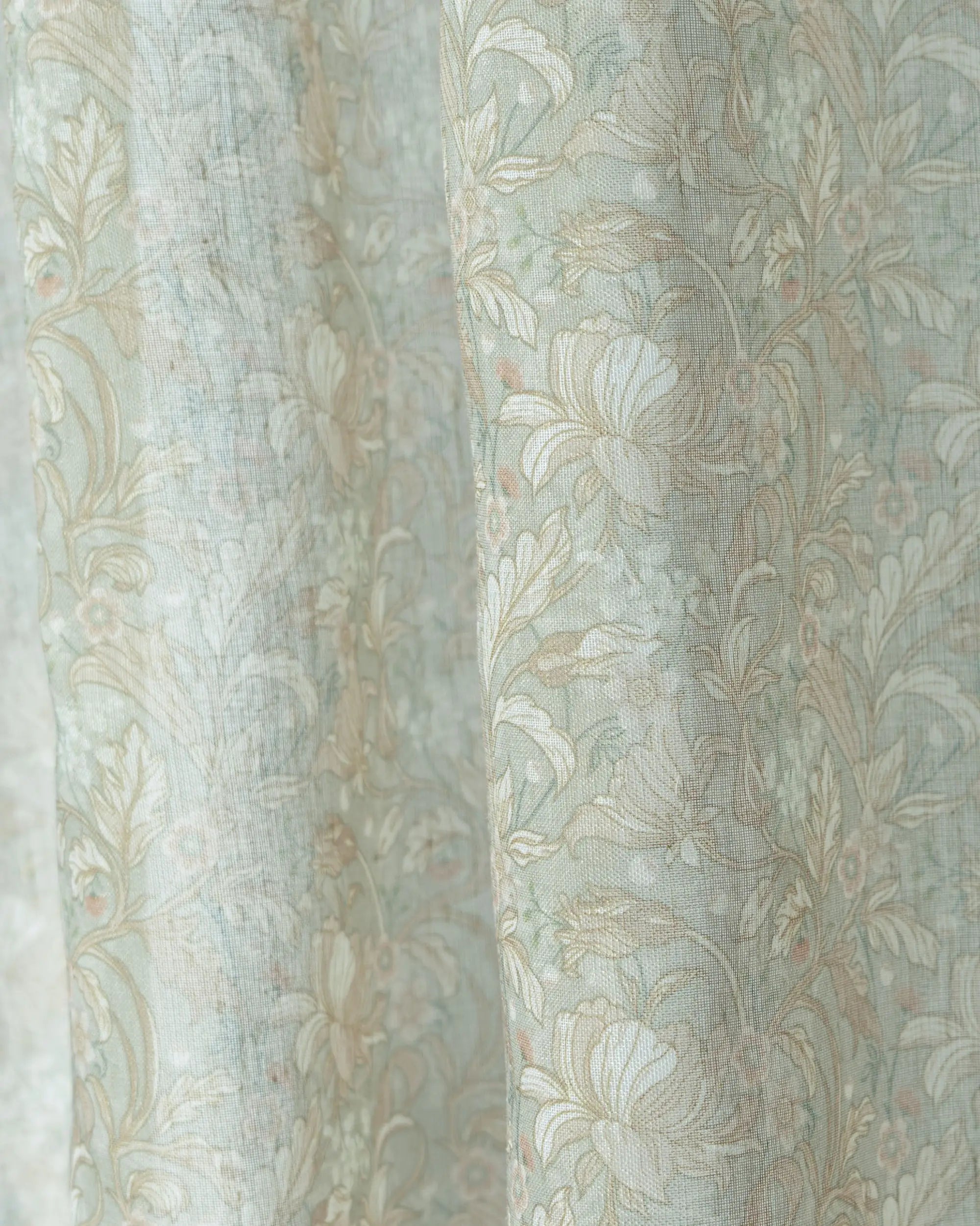 Awake Floral Patterned Sheer fabric swatches in light green and beige with an intricate botanical design for custom drapes.