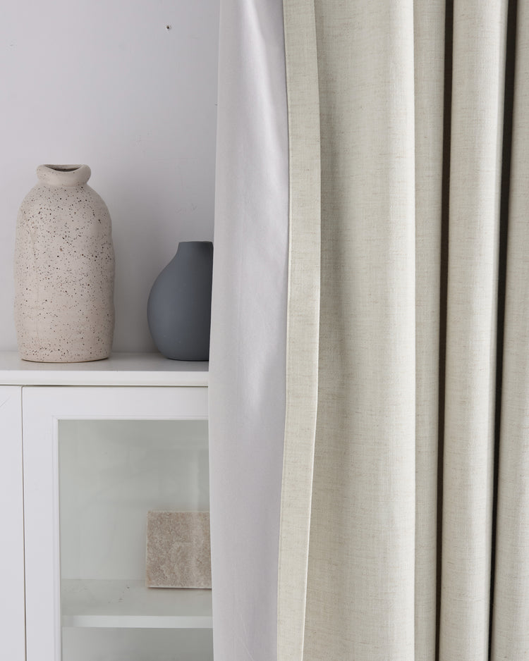Detailed view of Sally 4-layer 100% blackout linen blend custom curtain, highlighting beige textured fabric and light-blocking liner.