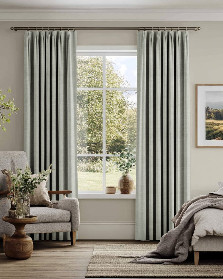 Elegant light grey linen blend custom curtains with French pleat header, tailored for sophisticated home aesthetics.